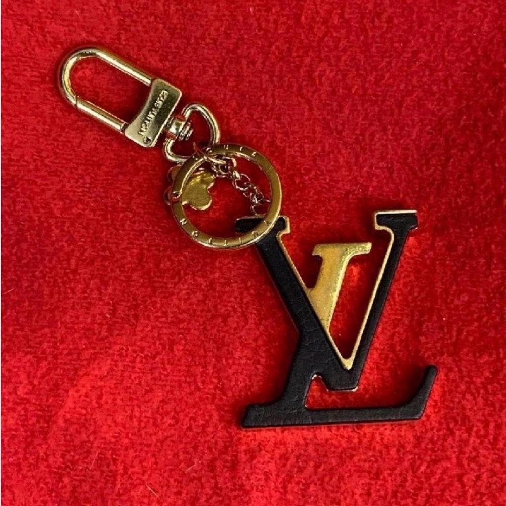 Authentic LV heavy gold and black keychain